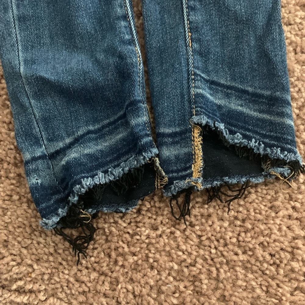 Blue ripped jeans